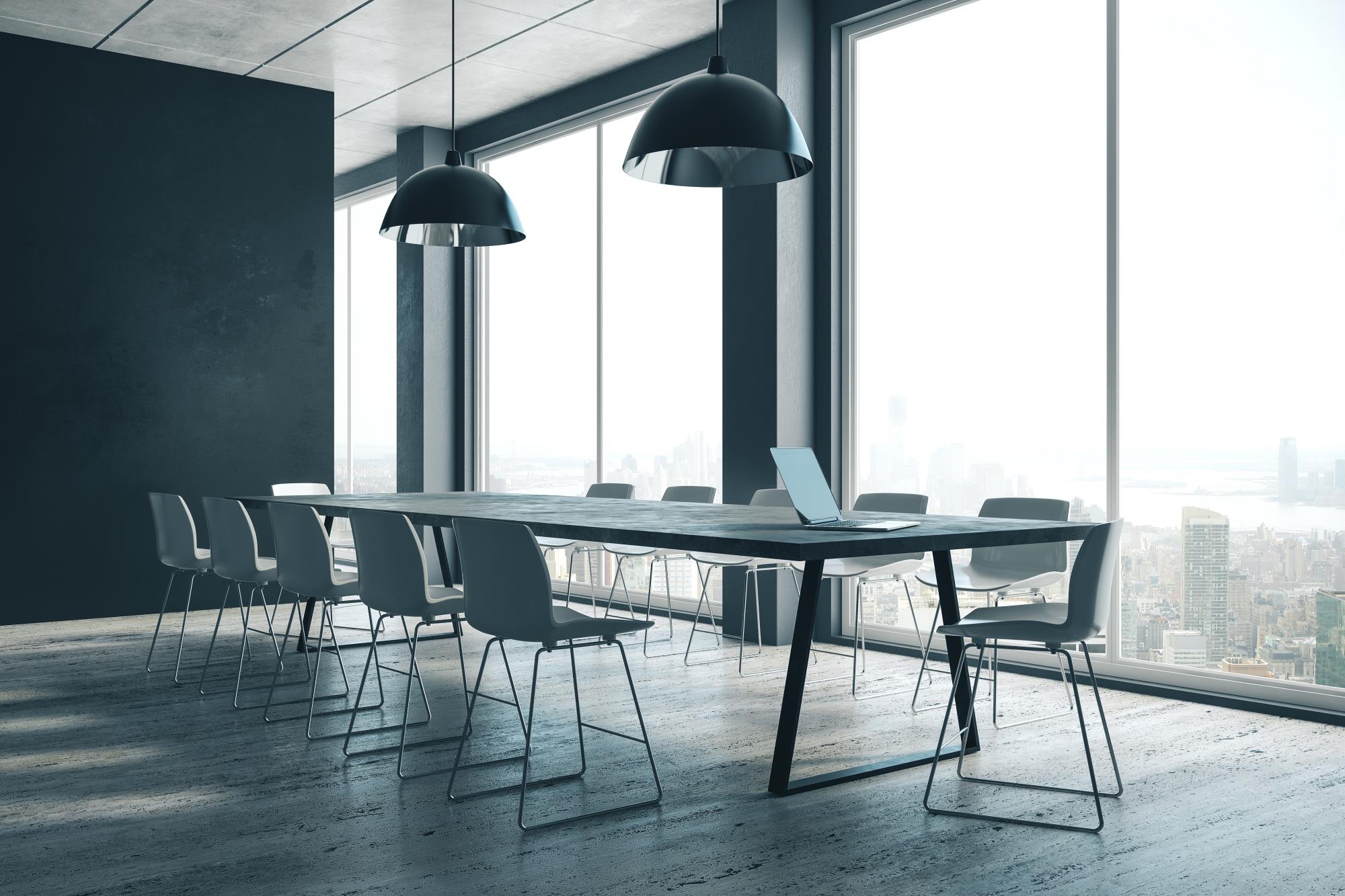 Meeting room with big windows. Big dark table with 12 dark high chairs