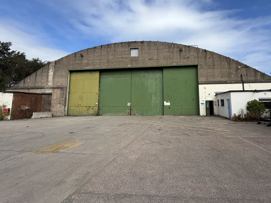 A large existing industrial hangar